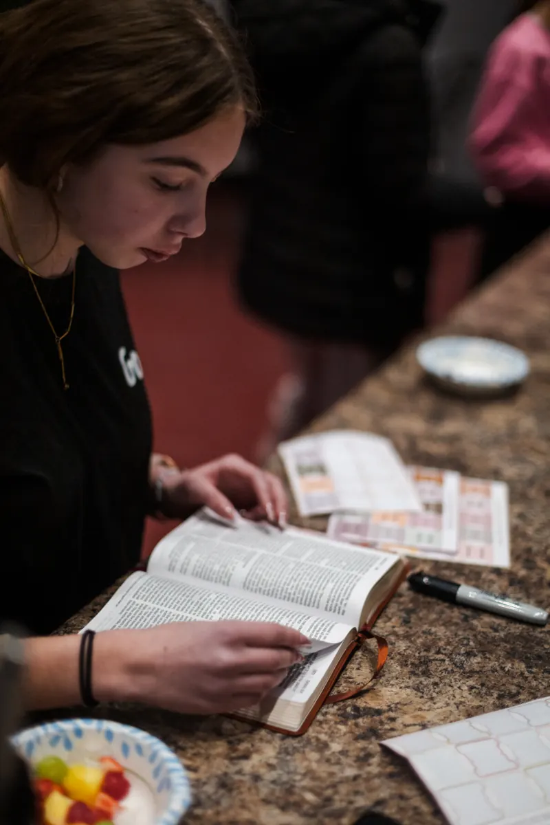 A student reading her Bible